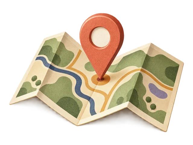 A folded map with a location pin dropped on it